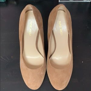 Nine west tan heals. Used once like new.